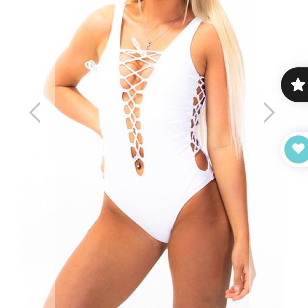 Never worn!! White lace up bathing suit